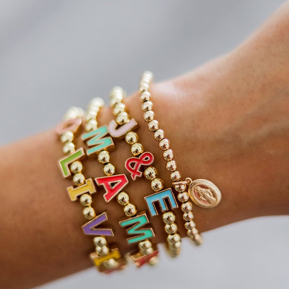 Color Pop Letter Bead Bracelet  Beaded bracelets, Letter bead bracelets,  Beaded bracelet patterns